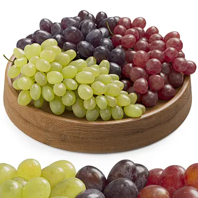 Grapes on a wooden plate