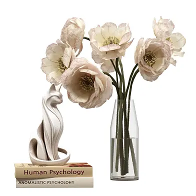 Decorative set with books, a cat figurine, and a bouquet