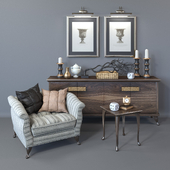 Cabinet, table and armchair Casa Statu with accessories from Eichholtz.