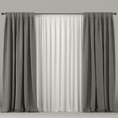 Gray curtains with white tulle.