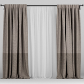 Brown curtains in two colors with tulle.