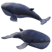 A stuffed whale toy made of old jeans