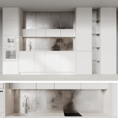 White kitchen with metallic decor