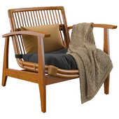 Noelie rattan lounge chair with cushion