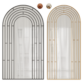 Arched mirror in a decorative metal frame