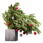 Spruce branches in a vase with Christmas balls
