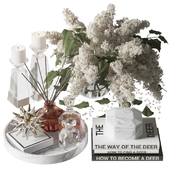Decorative set with a bouquet of lilacs