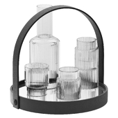 black round platform tray with ripple carafe water