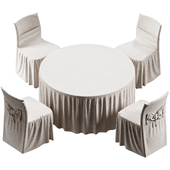 Tablecloth and chairs for a round table