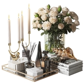 Decorative set with a bouquet of white roses and a shell